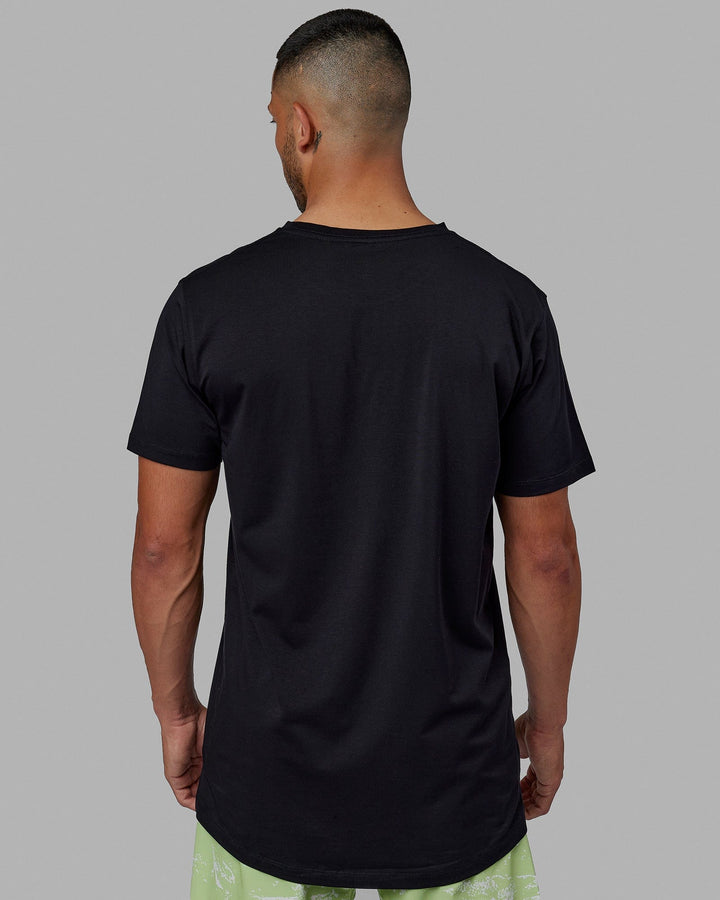 Man wearing Deluxe PimaFLX Tee - Black