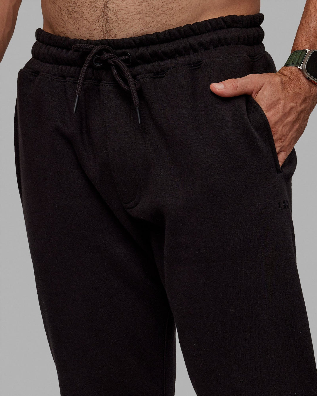 Man wearing MVP Track Pants - Black