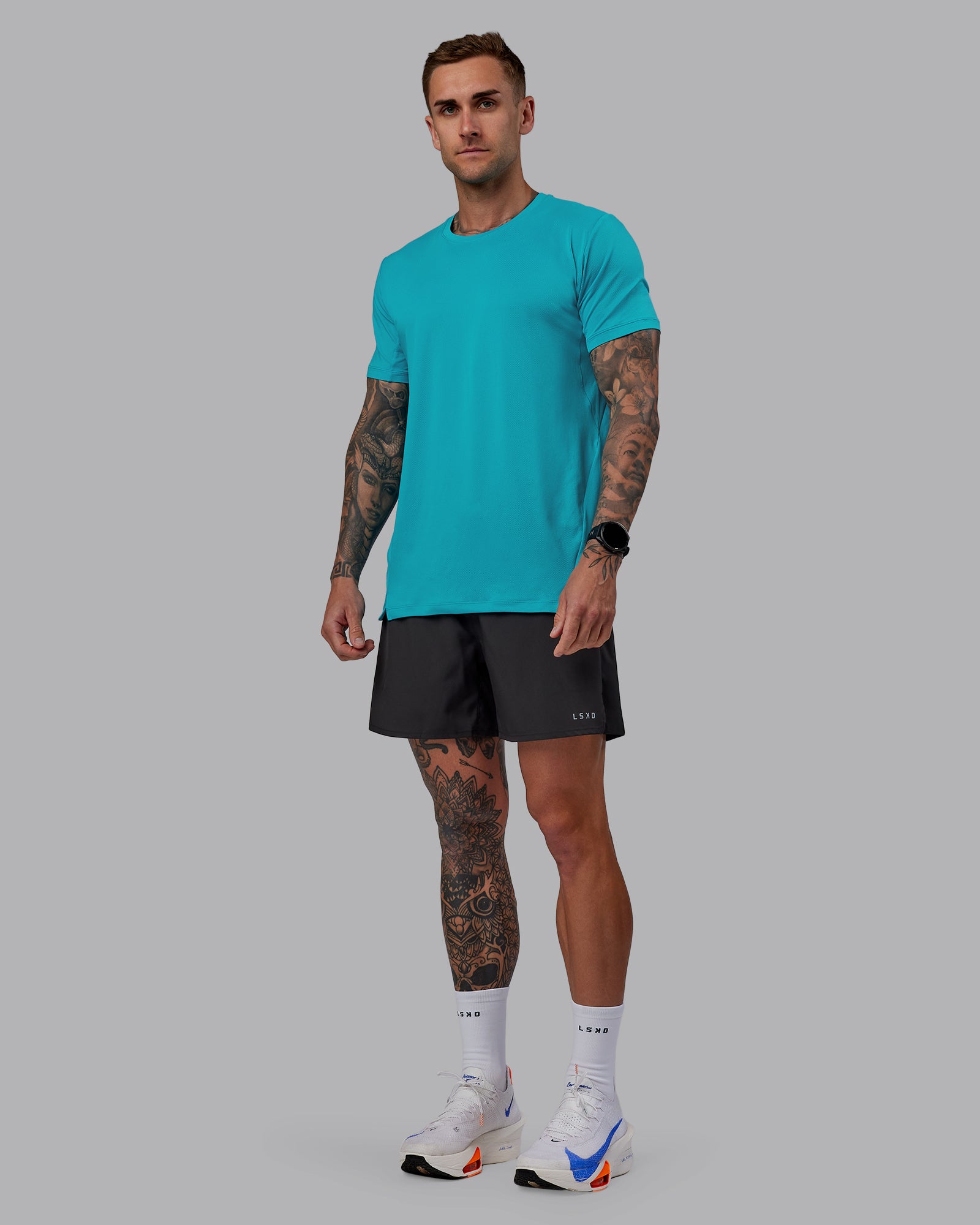 Man wearing Pace Running Tee - Blue Bird