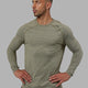 Man wearing Perform VapourFLX LS Tee - Olive Marl