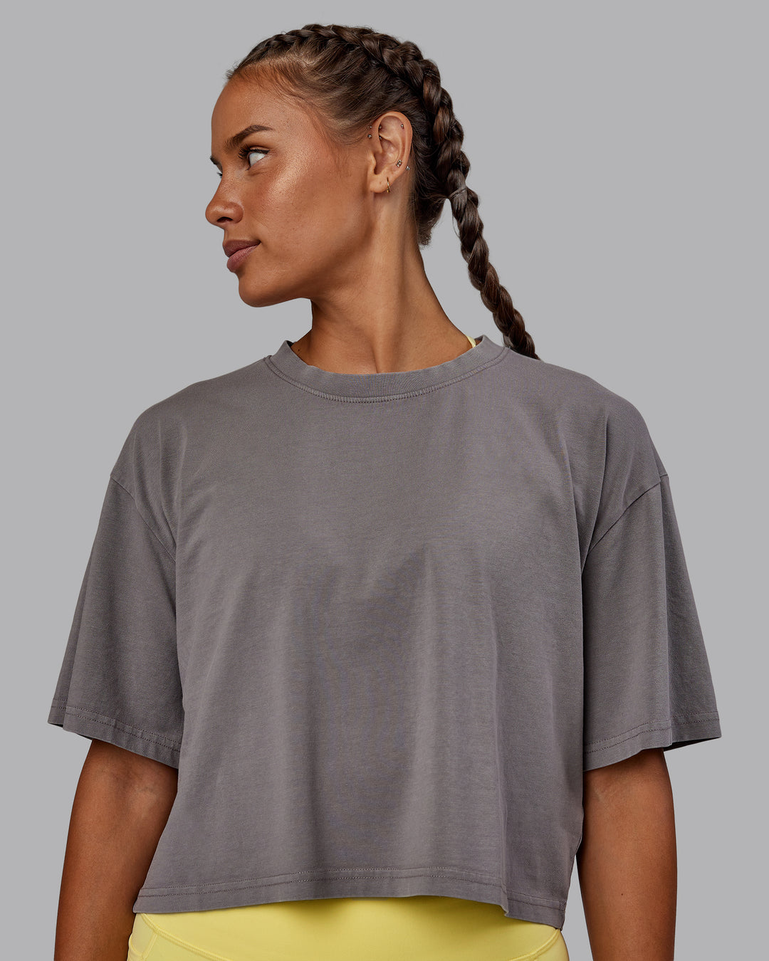 Woman wearing Miami 2025 FLXCotton Cropped Tee - Storm Front-Lemon Fizz