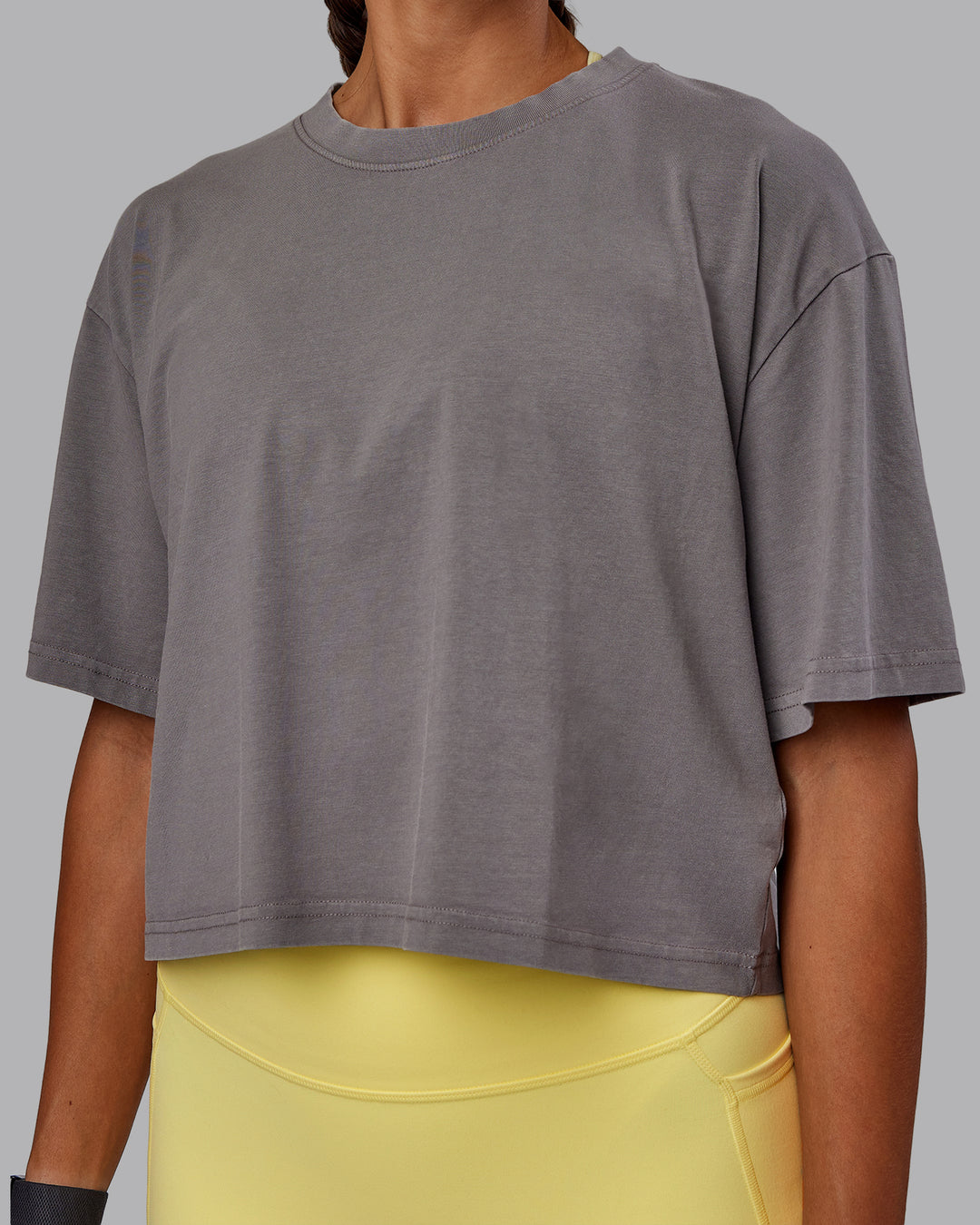 Woman wearing Miami 2025 FLXCotton Cropped Tee - Storm Front-Lemon Fizz
