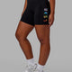 Woman wearing Rep Mid Short Tight - Pride-Black