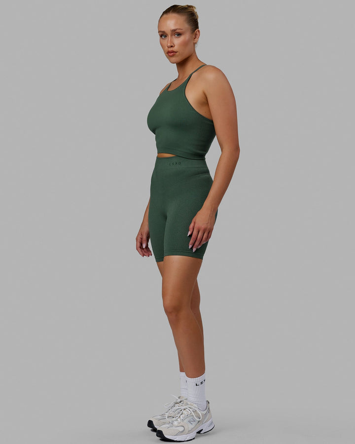 Woman wearing Minimal Seamless Crop Ribbed Tank - Dark Forest
