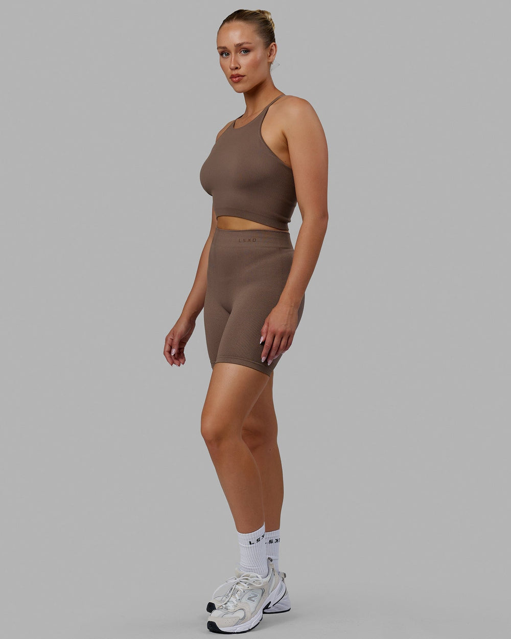 Woman wearing Minimal Seamless Crop Ribbed Tank - Deep Taupe