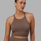 Woman wearing Minimal Seamless Crop Ribbed Tank - Deep Taupe