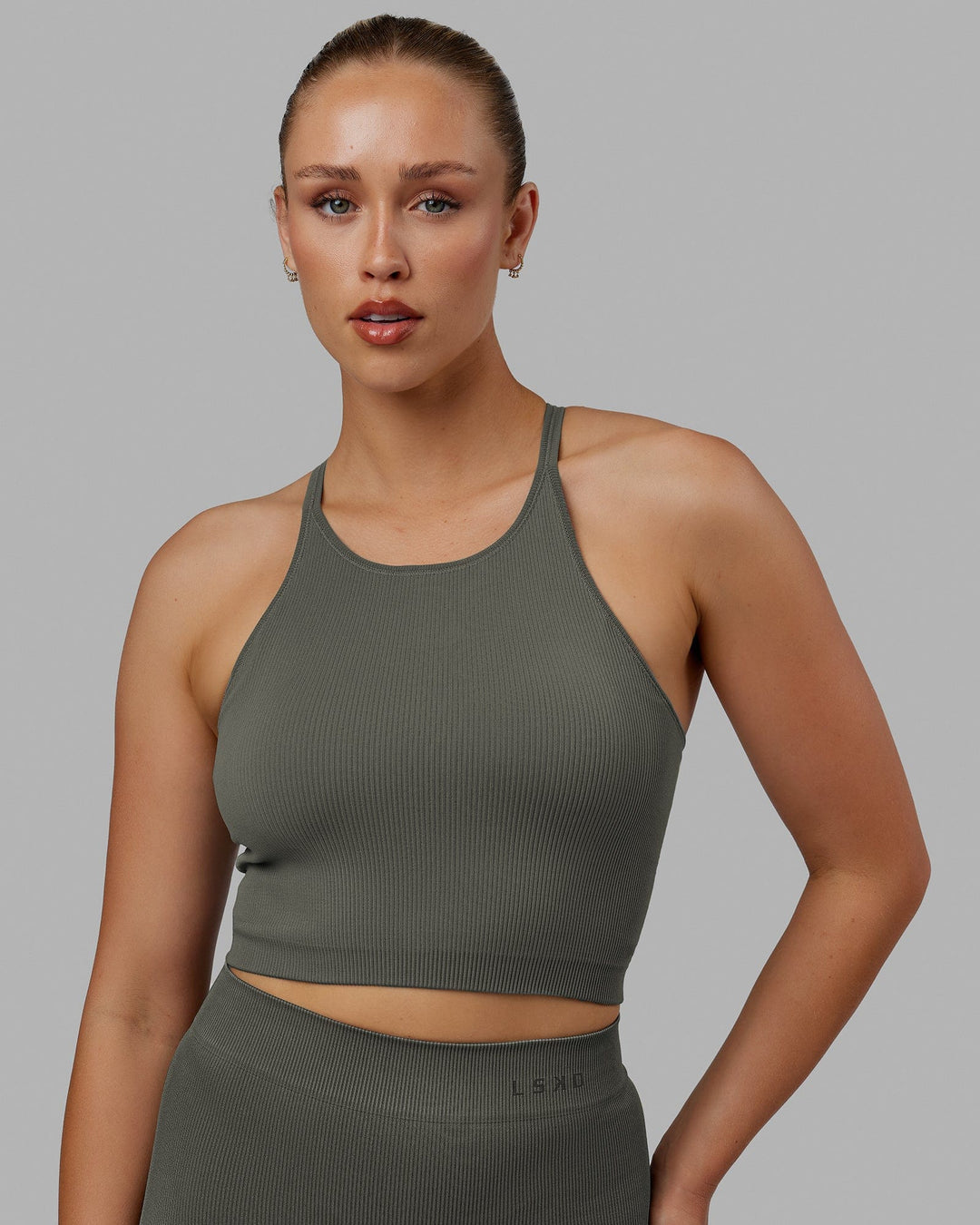 Woman wearing Minimal Seamless Crop Ribbed Tank - Graphite