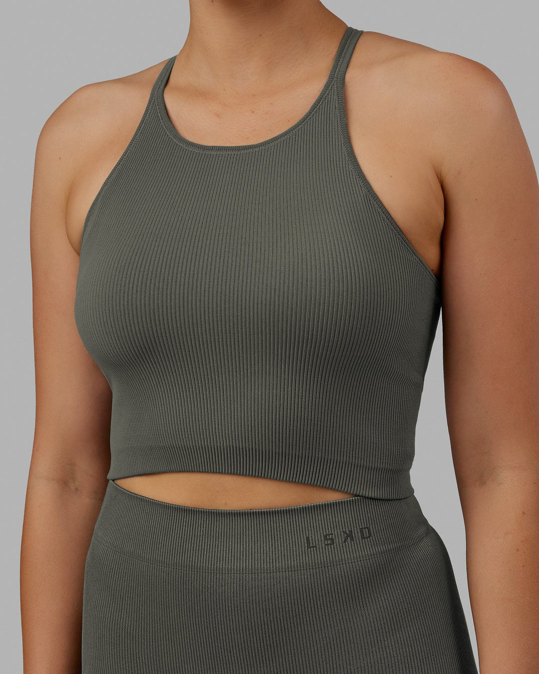 Woman wearing Minimal Seamless Crop Ribbed Tank - Graphite