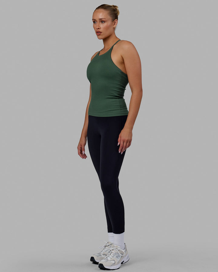 Woman wearing Minimal Seamless Ribbed Tank - Dark Forest