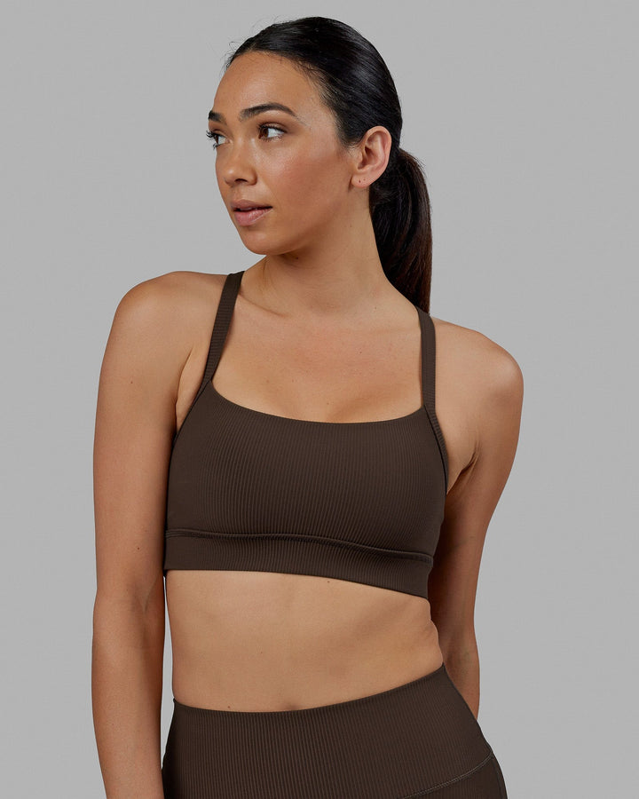 Woman wearing Momentum Ribbed Sports Bra - Dark Chocolate