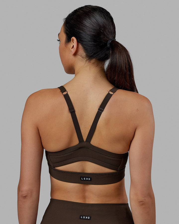 Woman wearing Momentum Ribbed Sports Bra - Dark Chocolate