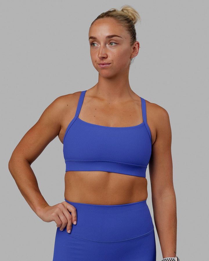 Woman wearing Momentum Ribbed Sports Bra - Power Cobalt