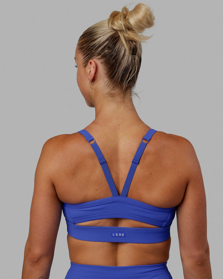 Woman wearing Momentum Ribbed Sports Bra - Power Cobalt
