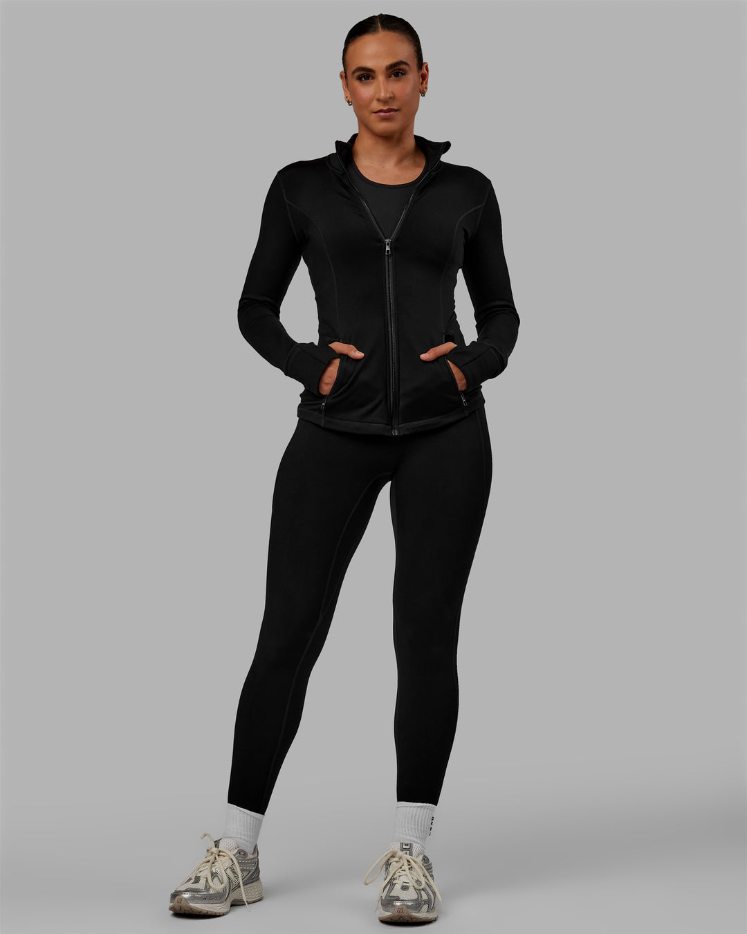 Woman wearing Motion Full Length Thermal Leggings - Black