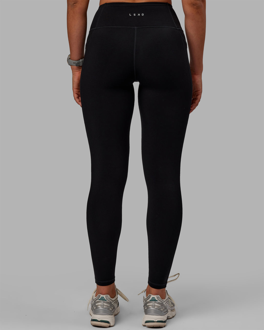 Woman wearing Motion Ultra High-Rise Thermal Full Length Legging - Black