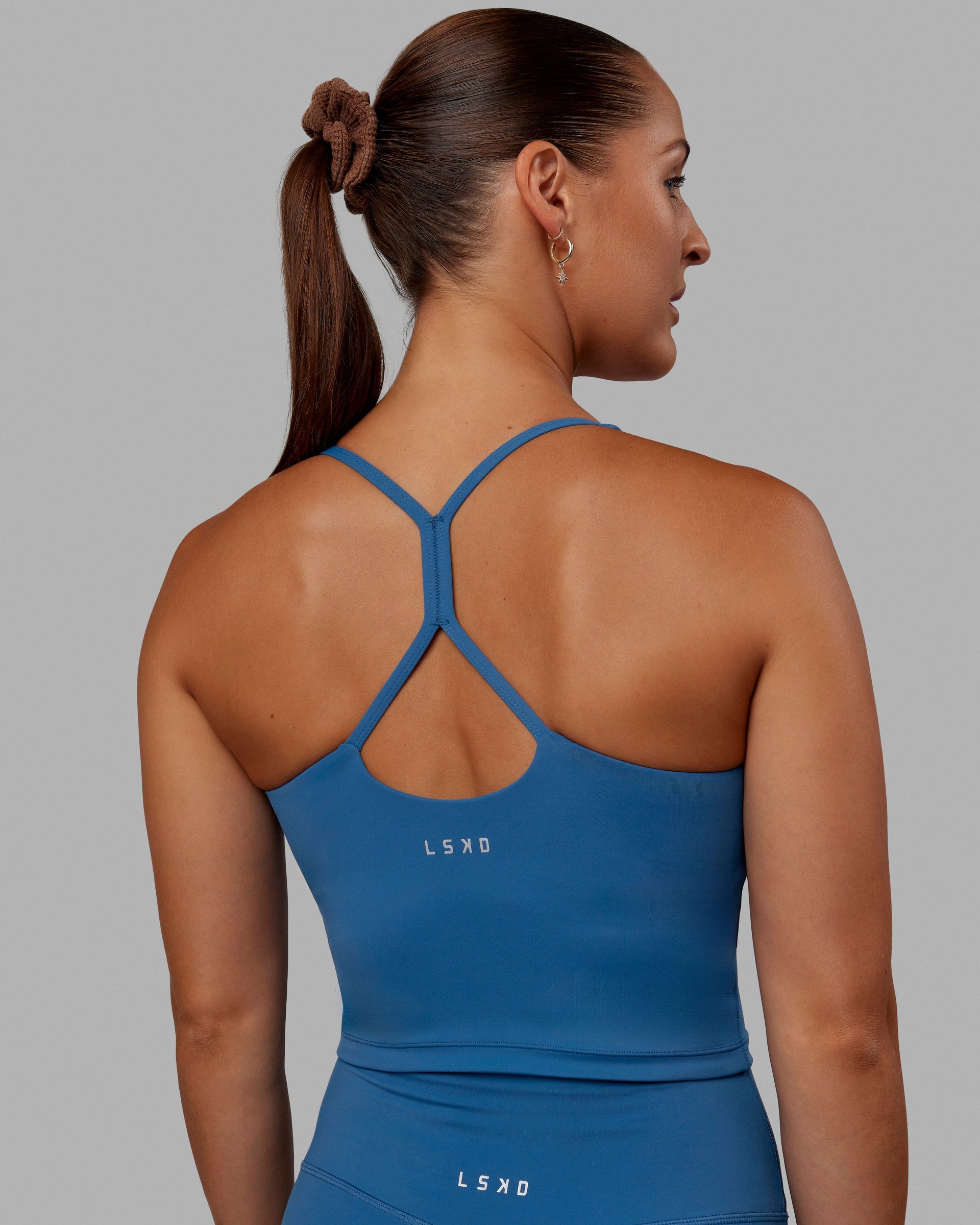 Woman wearing Movement Active Tank - High Tide