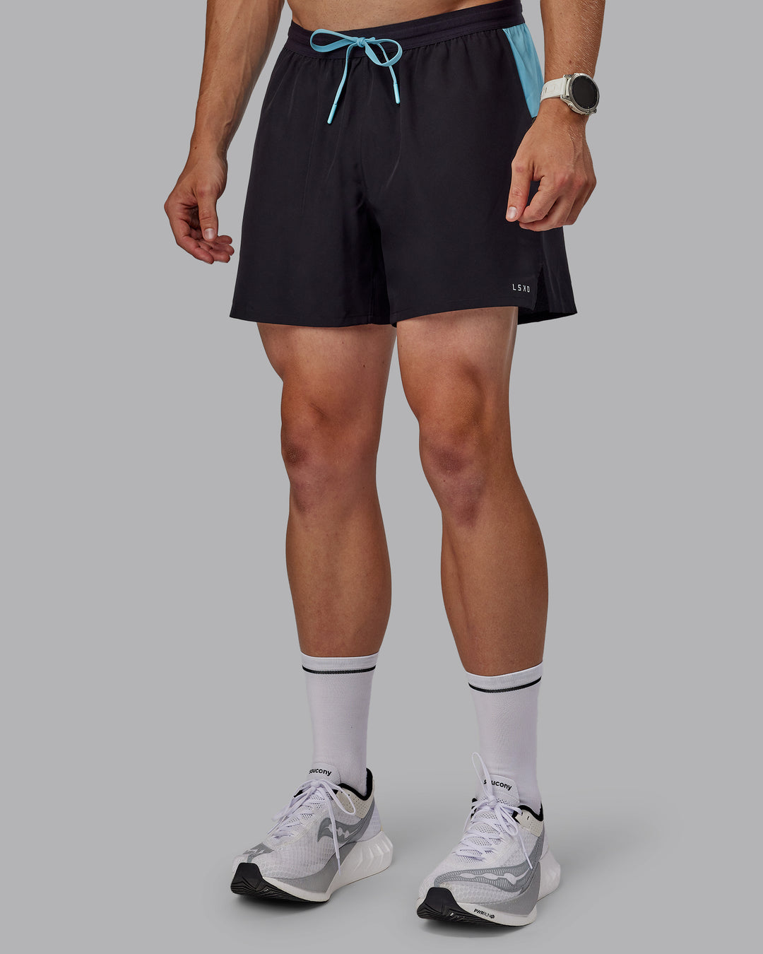 Man wearing Pace 5&quot; Lined Performance Shorts - Black-Retro Blue