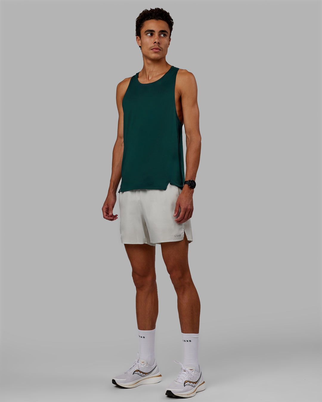 Man wearing Pace 5&quot; Lined Performance Shorts - Digital Mist-Reflective