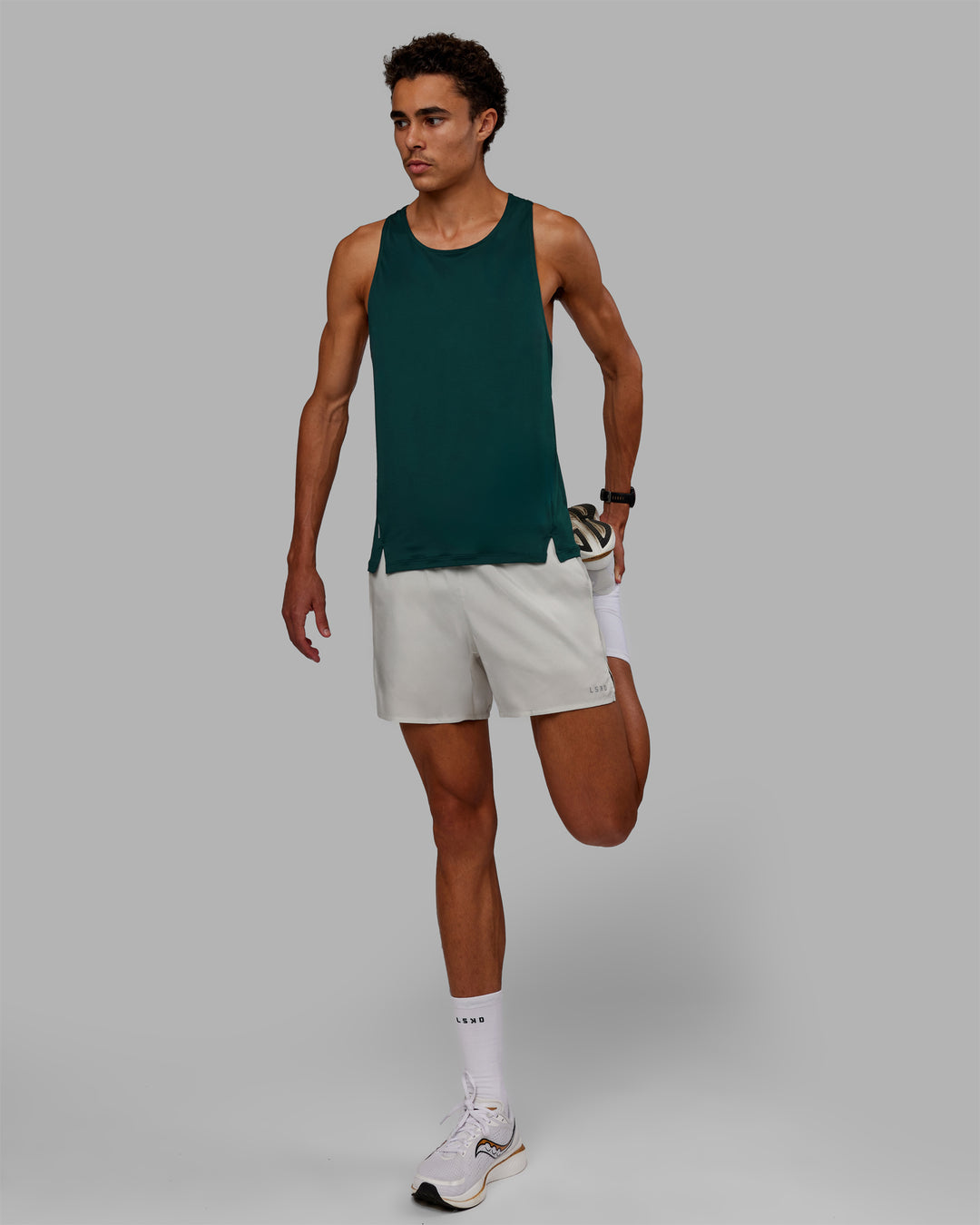 Man wearing Pace 5&quot; Lined Performance Shorts - Digital Mist-Reflective