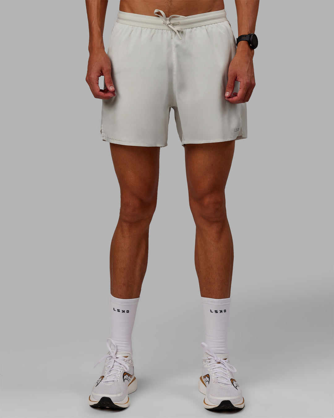 Man wearing Pace 5&quot; Lined Performance Shorts - Digital Mist-Reflective