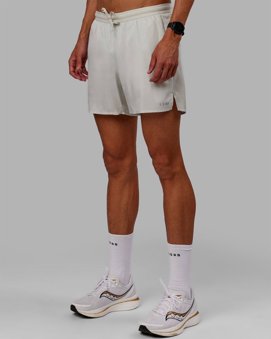 Man wearing Pace 5&quot; Lined Performance Shorts - Digital Mist-Reflective