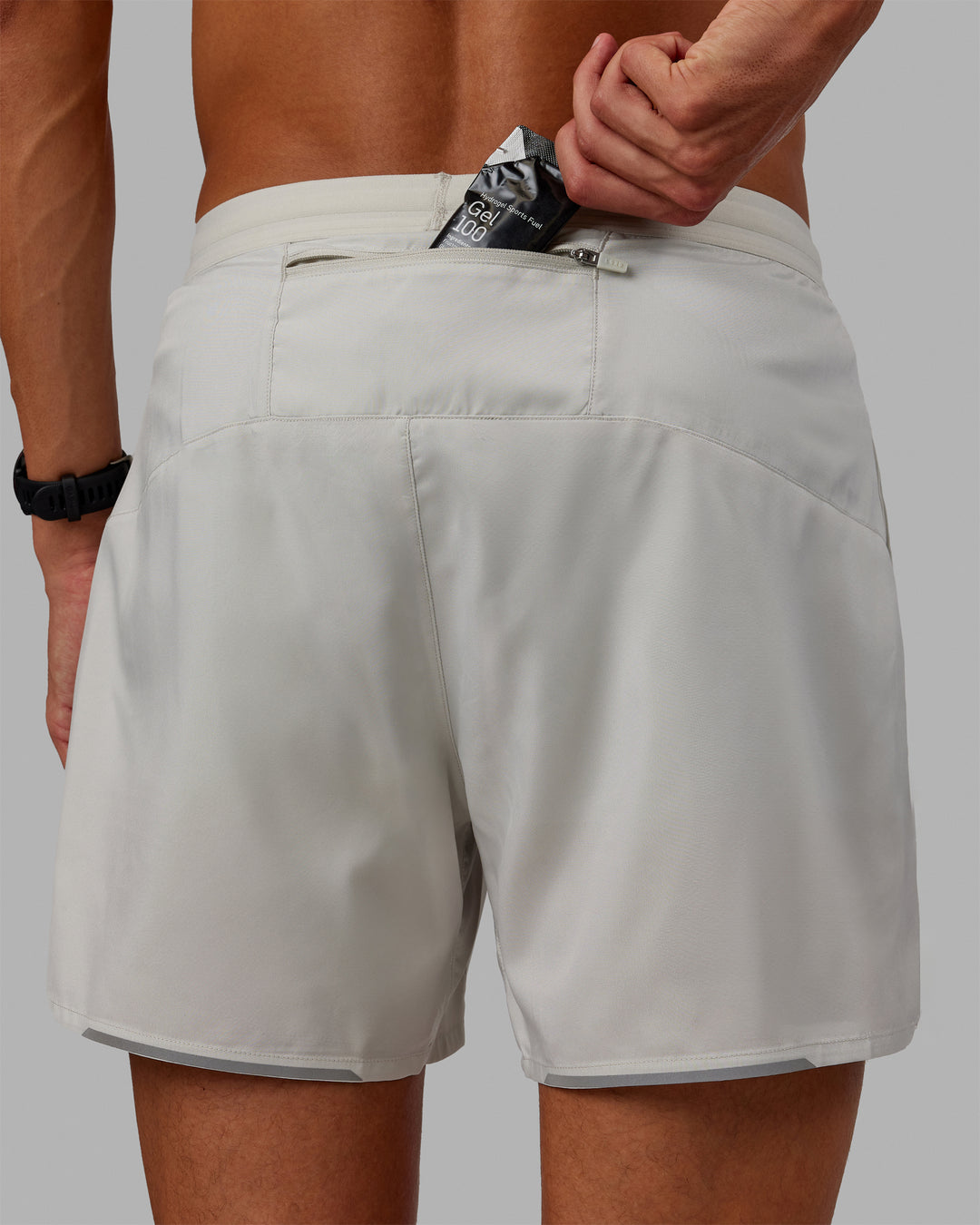 Man wearing Pace 5&quot; Lined Performance Shorts - Digital Mist-Reflective