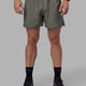 Man wearing Pace 5" Lined Performance Shorts - Graphite-Reflective