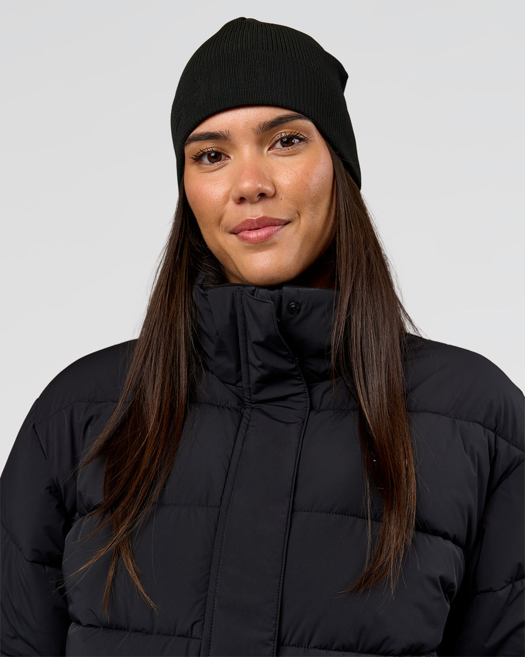 Woman wearing Pace Beanie in Black 