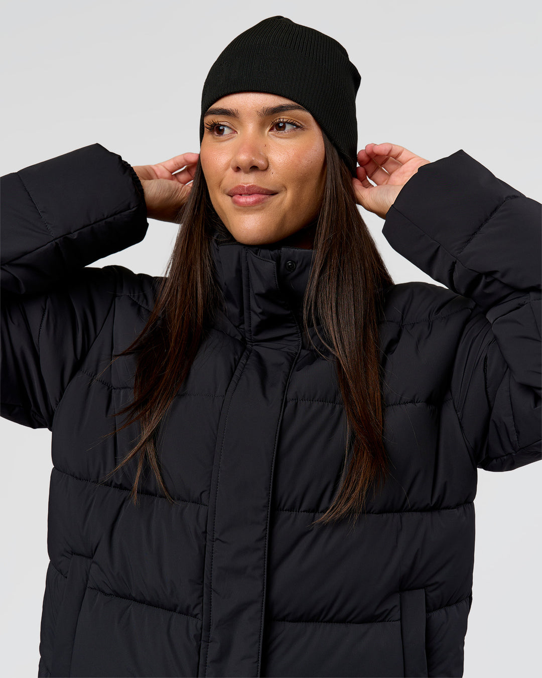 Woman wearing Pace Beanie in Black 