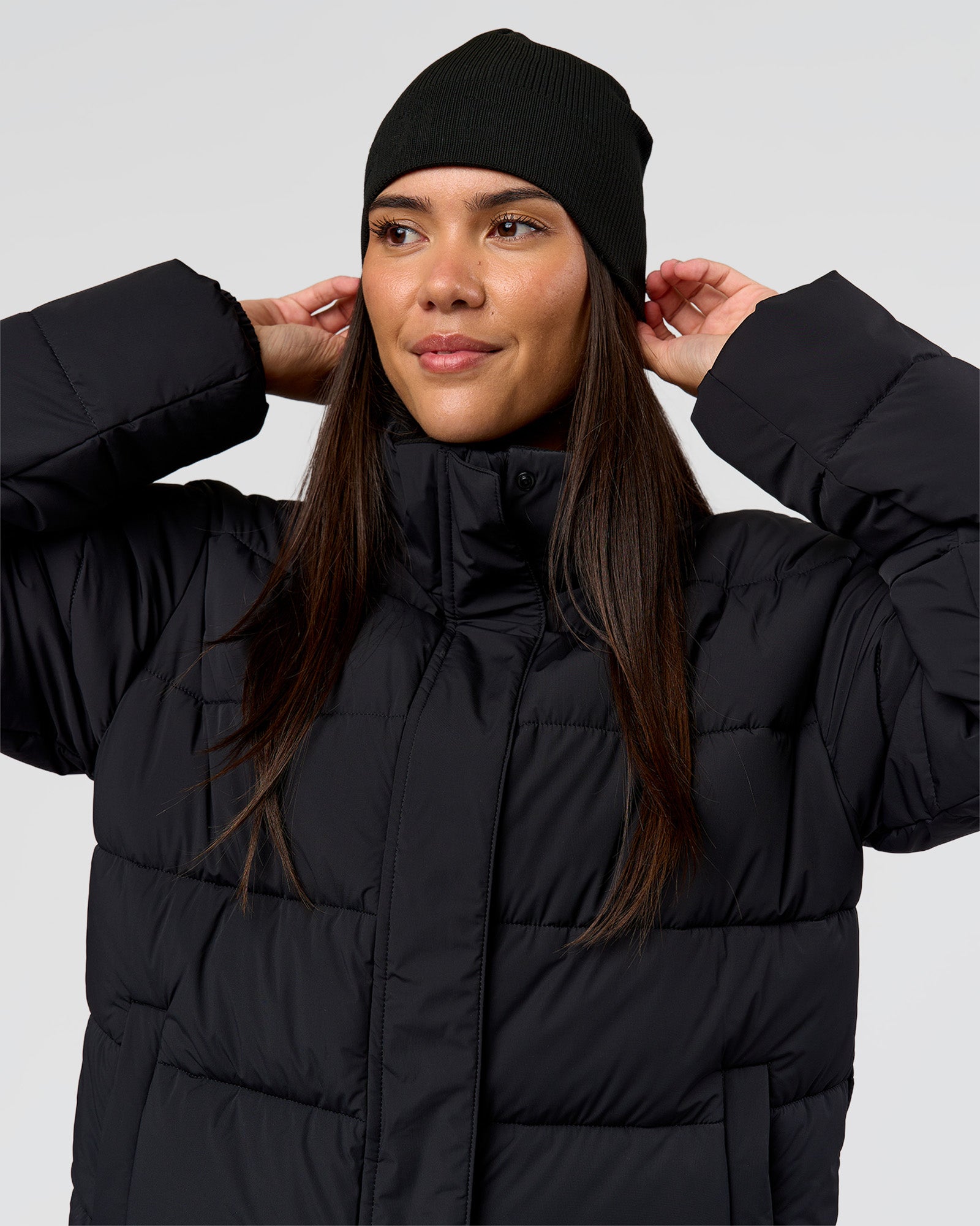 Woman wearing Pace Beanie in Black 