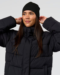 Woman wearing Pace Beanie in Black 