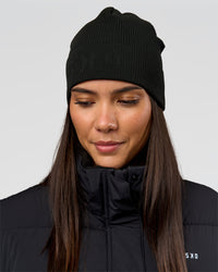 Woman wearing Pace Beanie in Black 