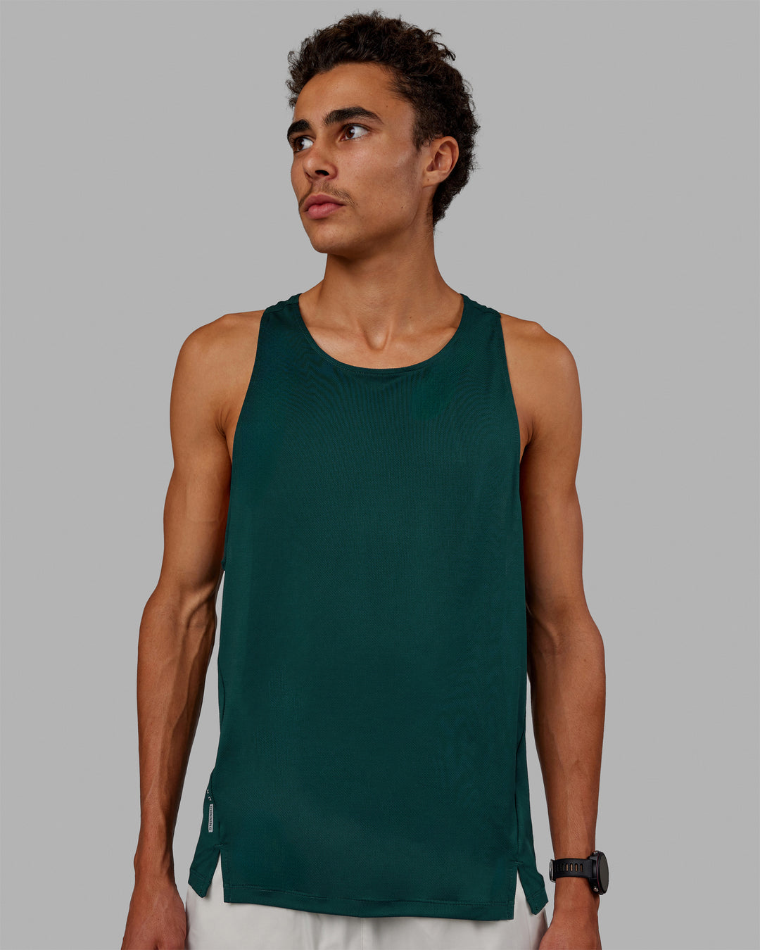 Man wearing Pace Running Tank - Dark Moss