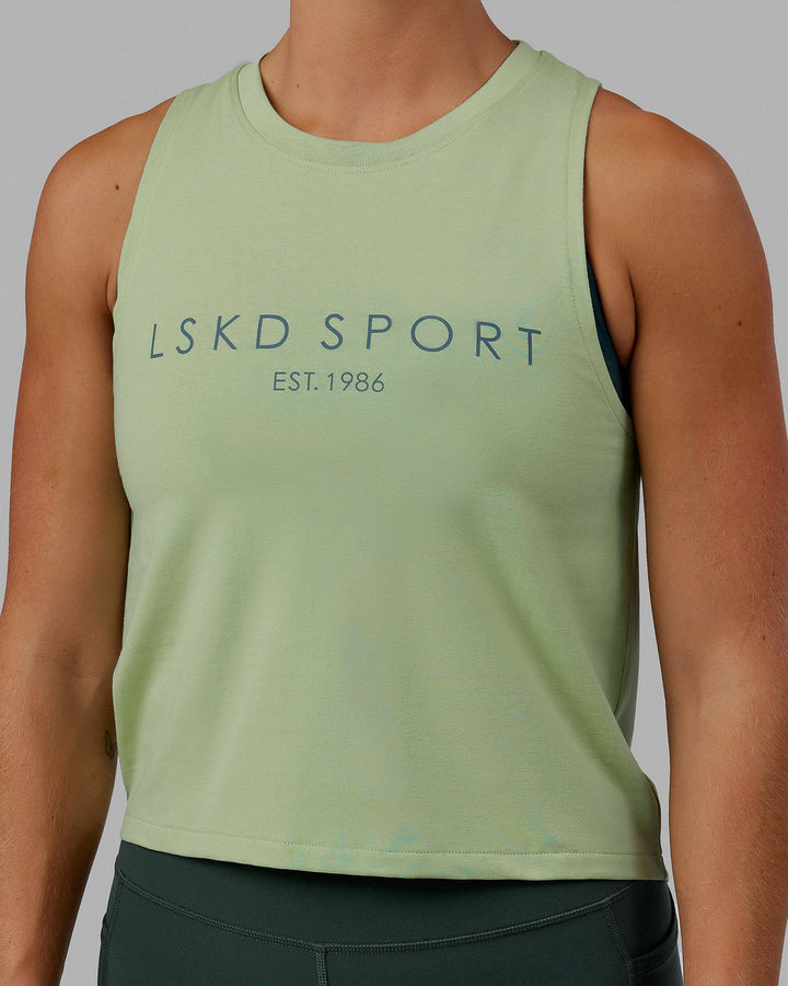 Woman wearing Penalty Tank - Green Fig-Storm