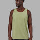 Man wearing Perform VapourFLX Tank - Moss Stone