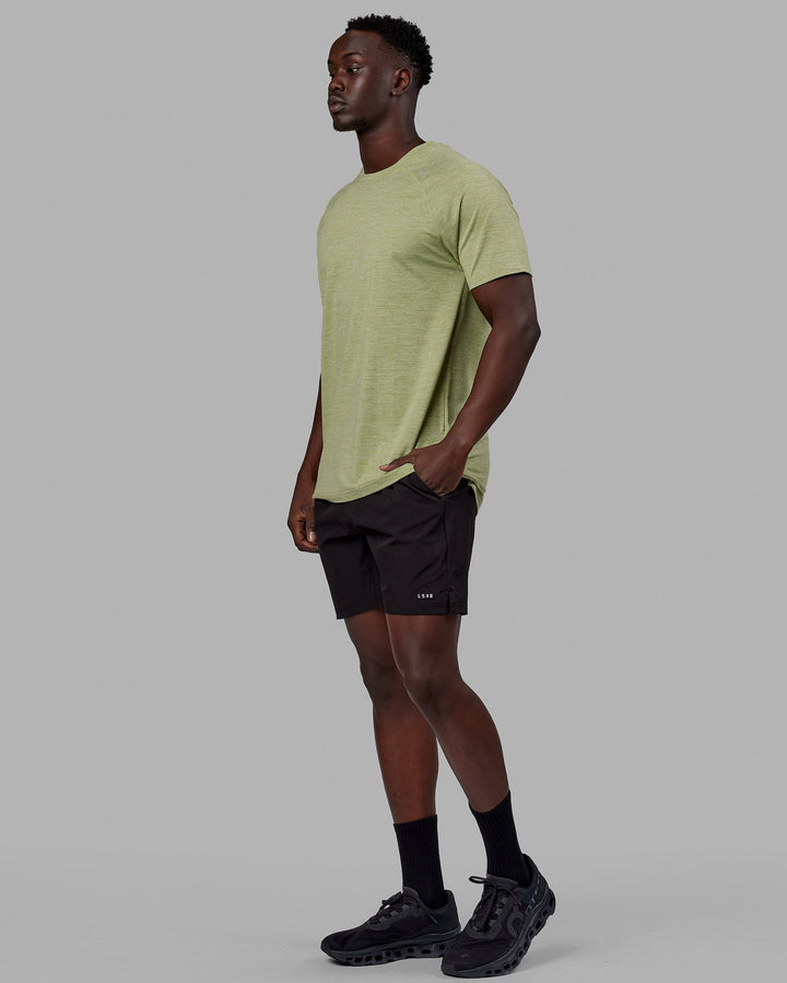 Man wearing Perform VapourFLX Tee - Moss Stone