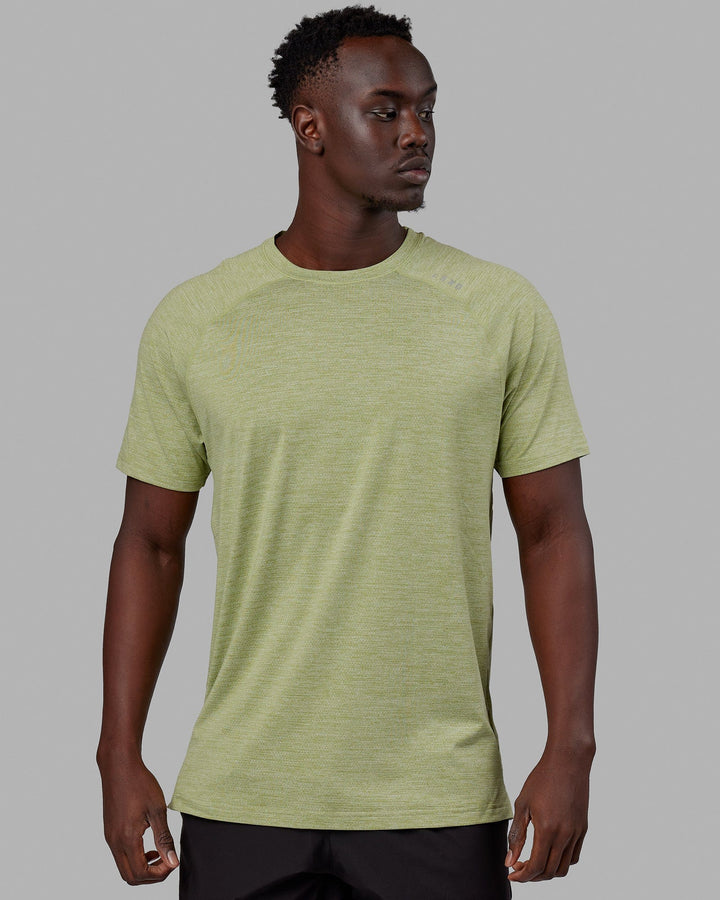 Man wearing Perform VapourFLX Tee - Moss Stone