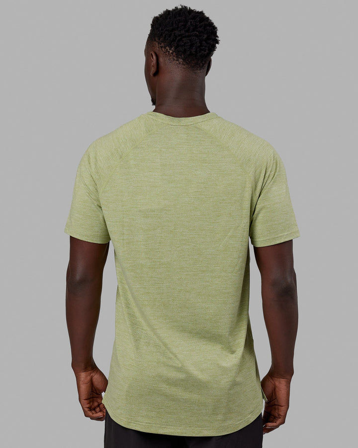 Man wearing Perform VapourFLX Tee - Moss Stone