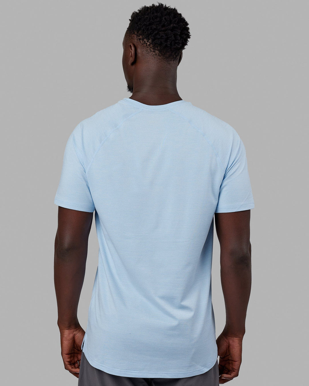 Man wearing Perform VapourFLX Tee - Windsurfer