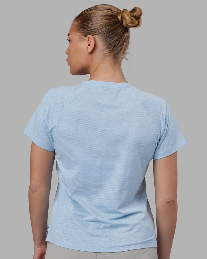Woman wearing Perform VapourFLX Tee - Windsurfer Marl