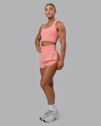 Woman wearing Power Train 2" Shorts - Murex Shell