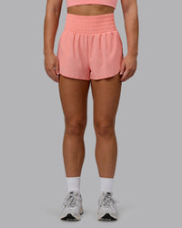 Woman wearing Power Train 2" Shorts - Murex Shell
