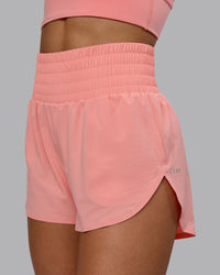 Woman wearing Power Train 2" Shorts - Murex Shell