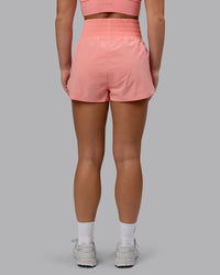Woman wearing Power Train 2" Shorts - Murex Shell