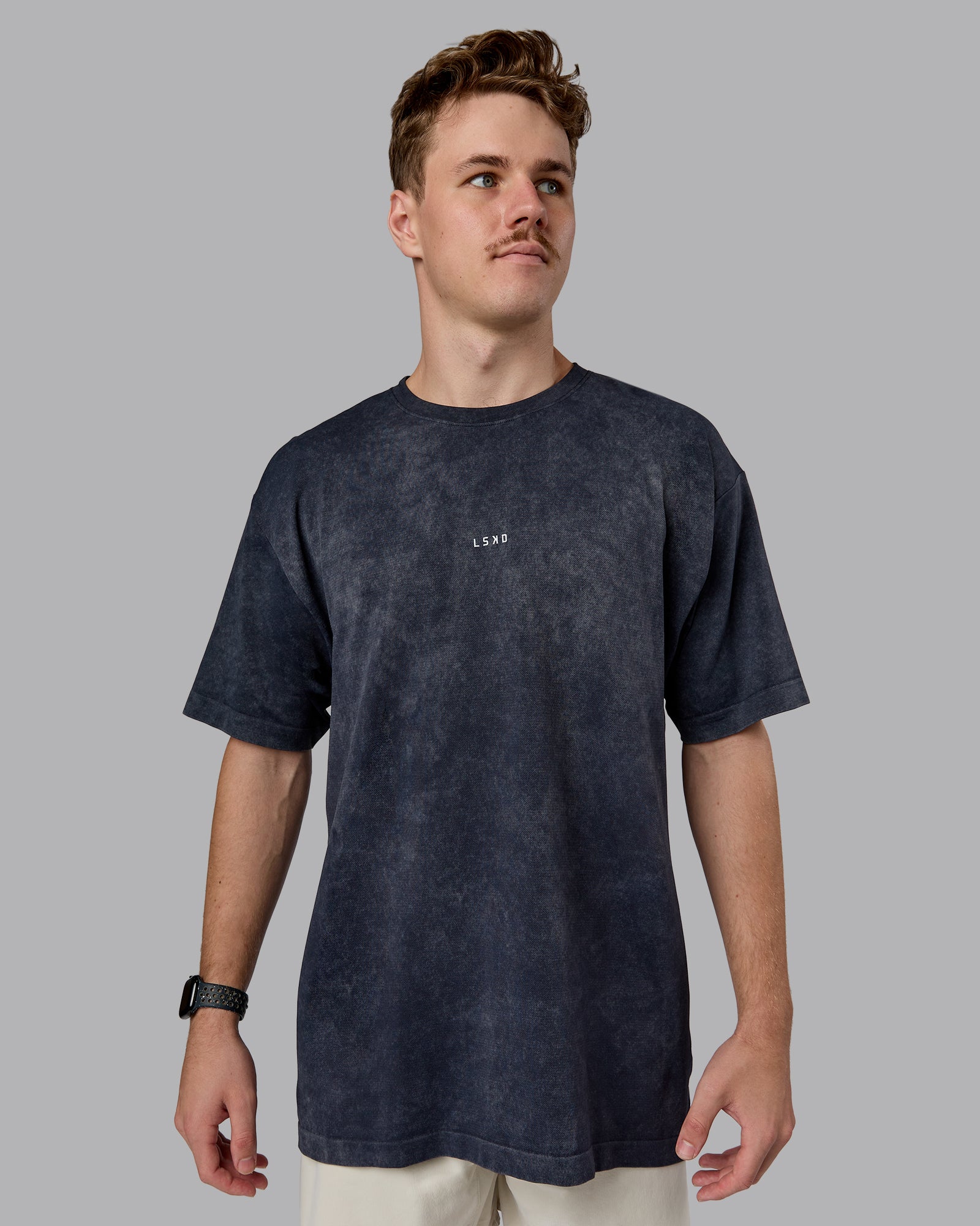 Man wearing Power Oversized Tee - Pirate Black Washed |Model:Cameron | Size:M
