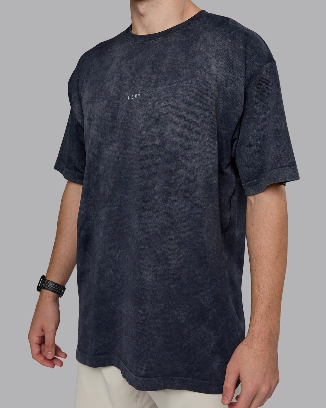 Man wearing Power Oversized Tee - Pirate Black Washed |Model:Cameron | Size:M
