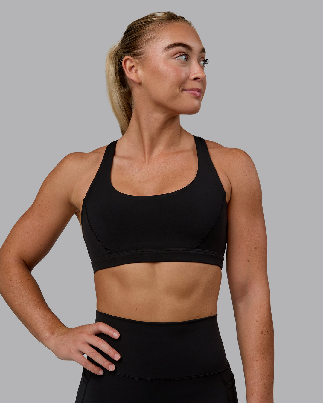 Woman wearing Precision Sports Bra - Black