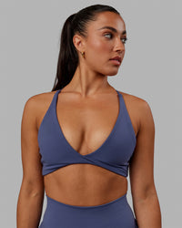 Woman wearing Progression Sports Bra - Future Dusk | Thumbnail Index: 1