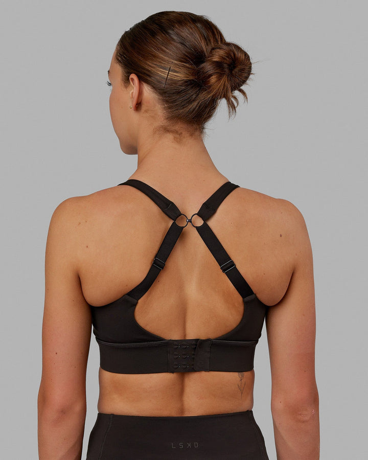 Woman wearing Propel Sports Bra - Dark Walnut