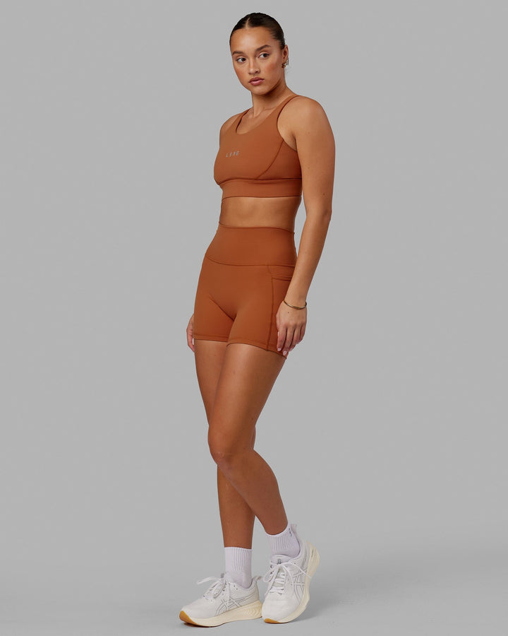 Woman wearing Propel Sports Bra - Hazel
